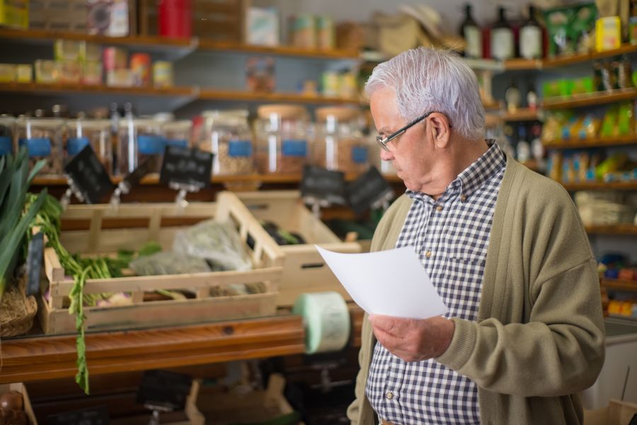 consumer reading fine print